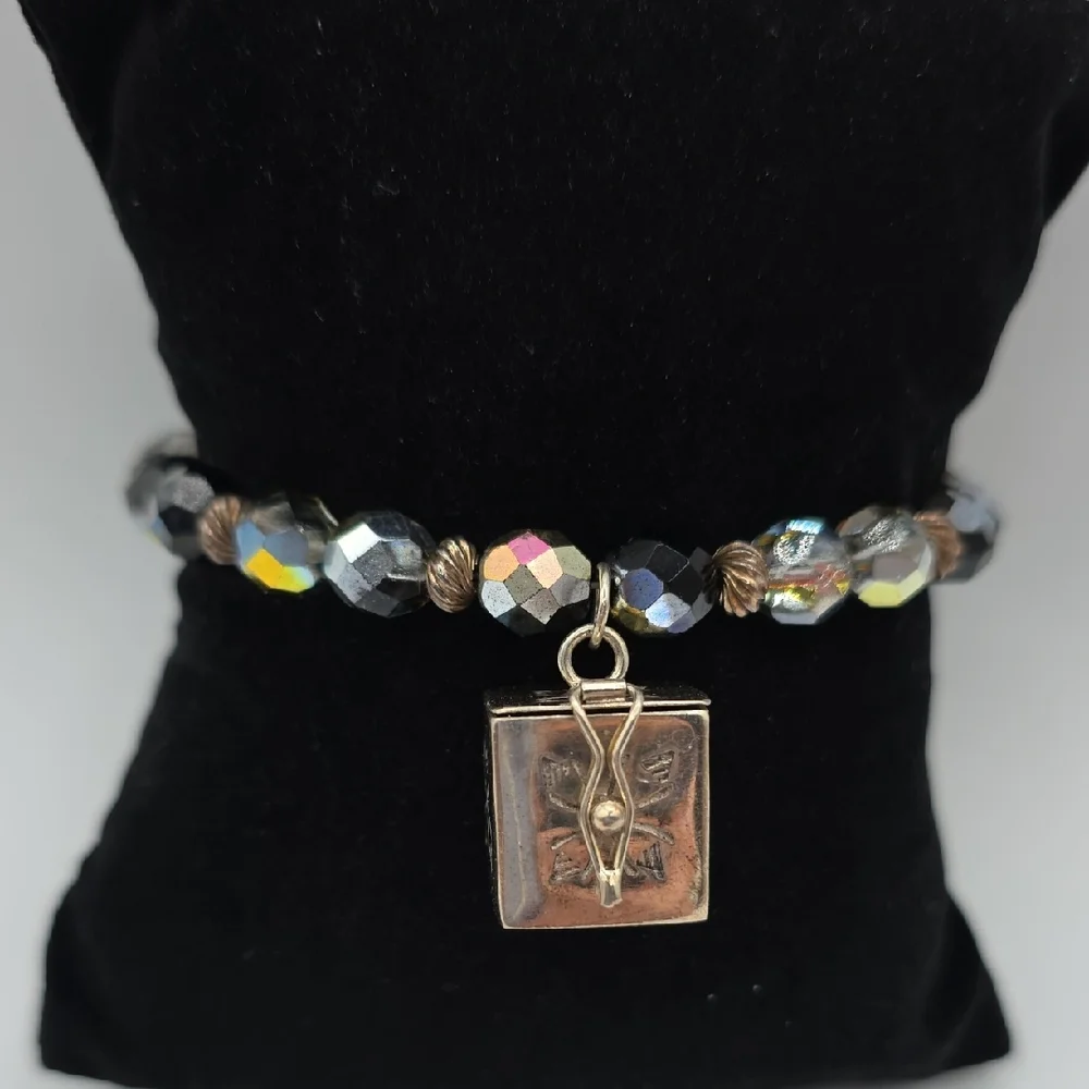 Elegant Black and Gold Charm Bracelet
